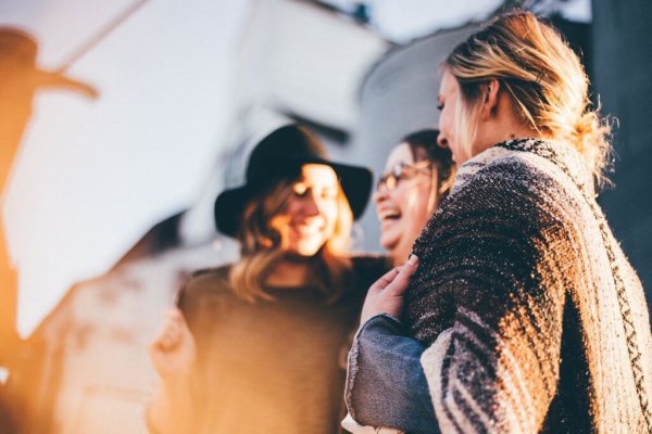 a group of girls laughing together
