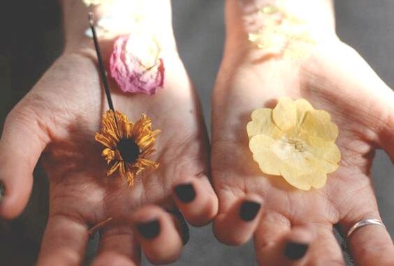 Flowers in hands.