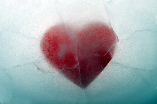 A heart is frozen in the water.