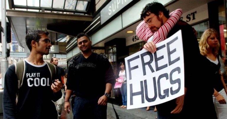 Juan Mann giving out free hugs