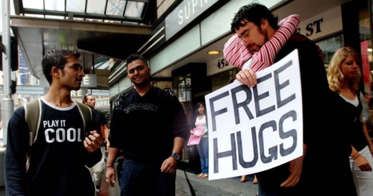 Juan Mann giving  out free hugs
