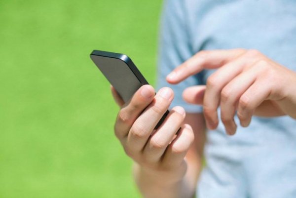 A man with a smartphone.