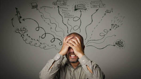 A frustrated, overwhelmed man.