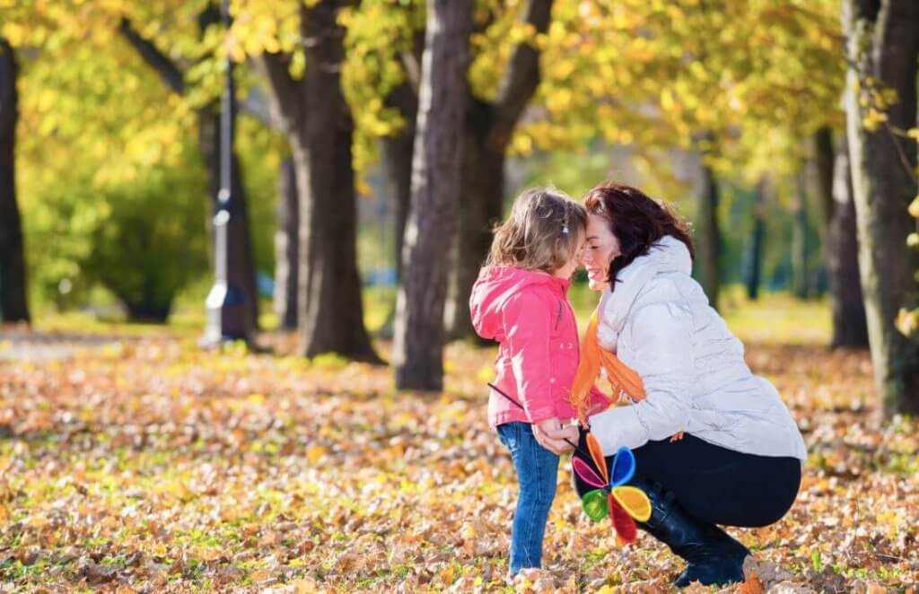 Mother and daughter embracing.