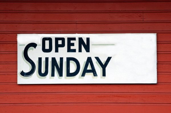 Sign saying "open Sunday"