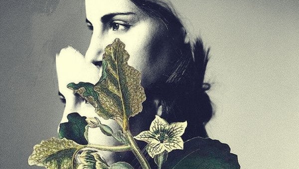 a woman with a plant