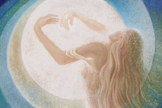 Spirituality: a woman hugging the sun.