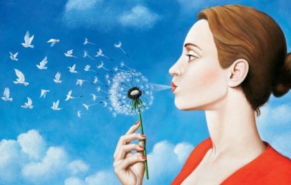 a woman blowing a dandelion, turning into doves