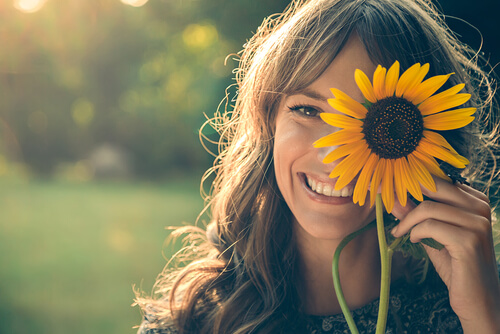 a woman smiling and laughing
