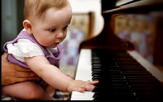 musical intelligence in a baby playing the piano