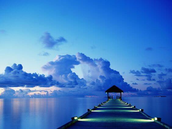A blue sea and blue sky.
