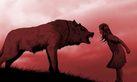 A wolf and a girl roaring at each other.