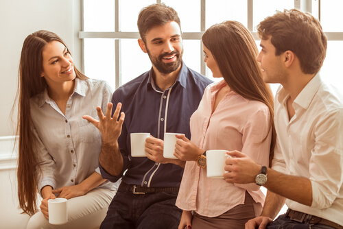 Friends talking over coffee.