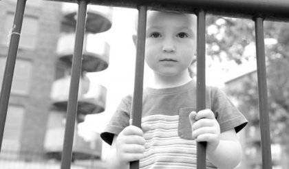 a child behind bars