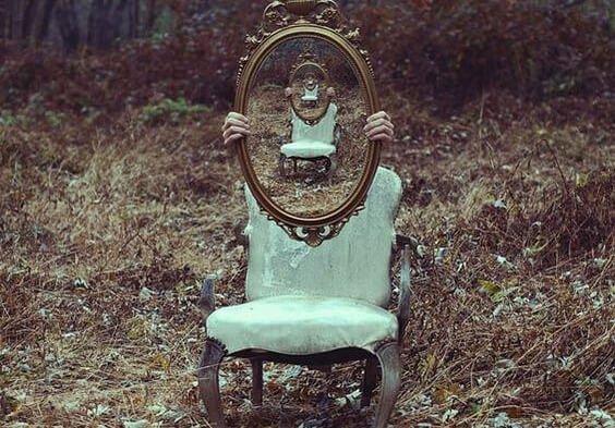 A mirror on a chair.