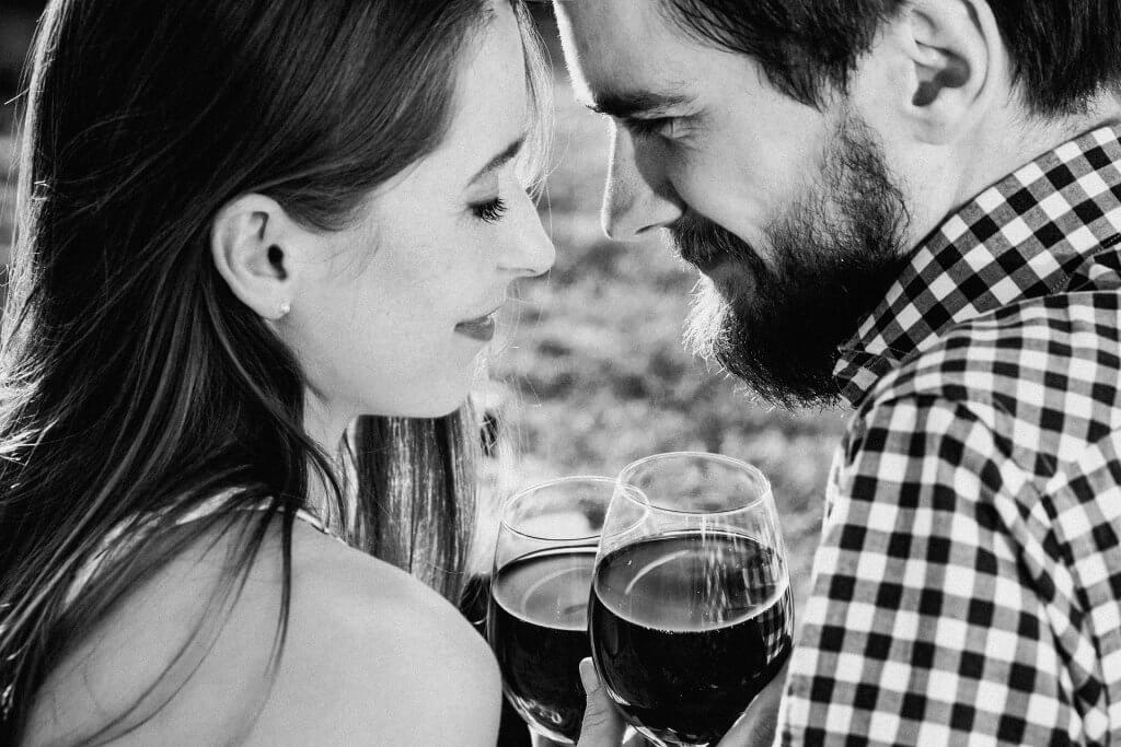 A couple with wine: male and female brains.