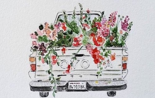 A truck filled with flowers.