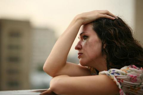 A depressed woman with dissatisfaction with life.