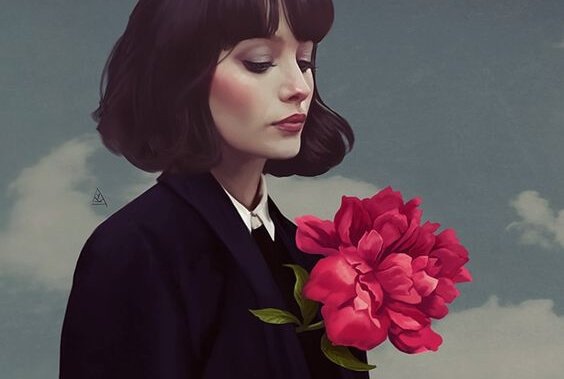 A woman in a suit with pink flowers.