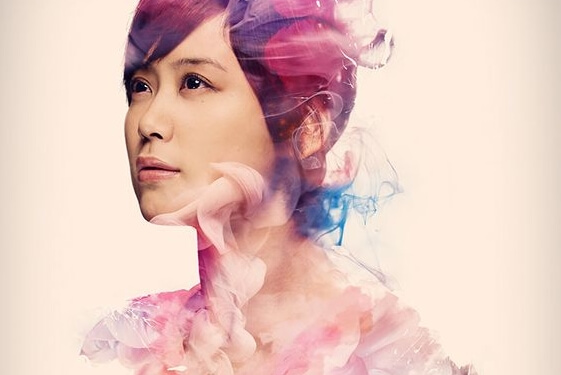 A woman in purple and blue.