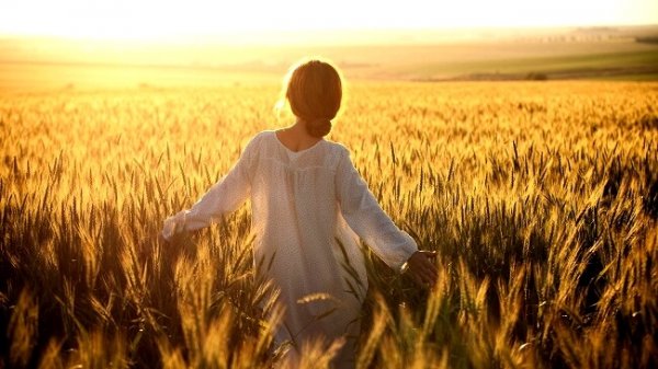 Woman walking in field