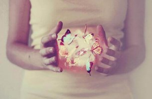 Woman with lights and butterflies embellishing life