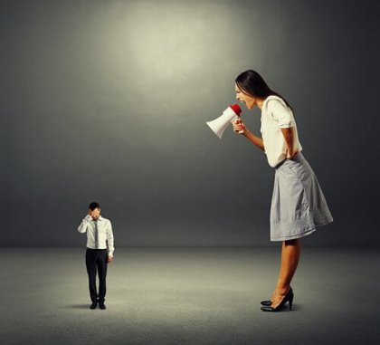 a giant woman yelling at a tiny man