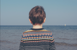 Boy looking at sea