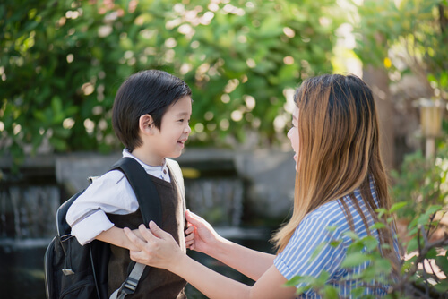 A mother and her son after school.
