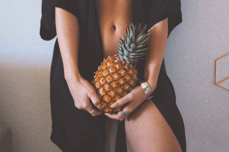holding pineapple