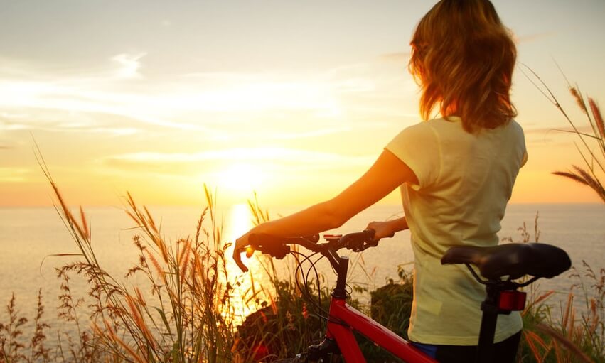 A sunset bike ride by the water.
