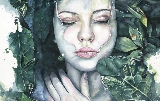 A girl is almost underwater and surrounded by leaves.