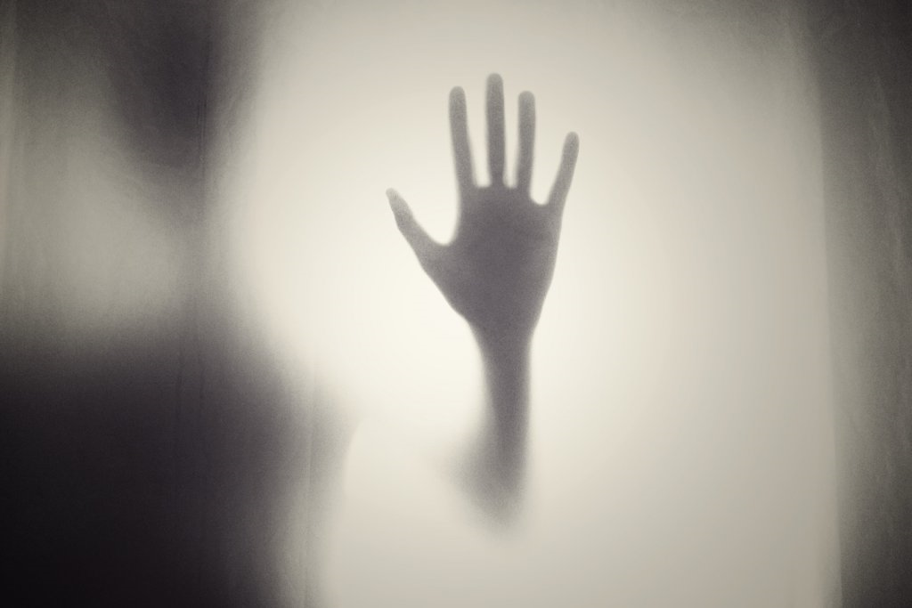 A hand symbolizing domestic abuse.