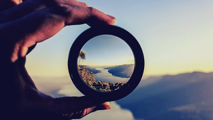A magnifying glass picturing how to motivate yourself.