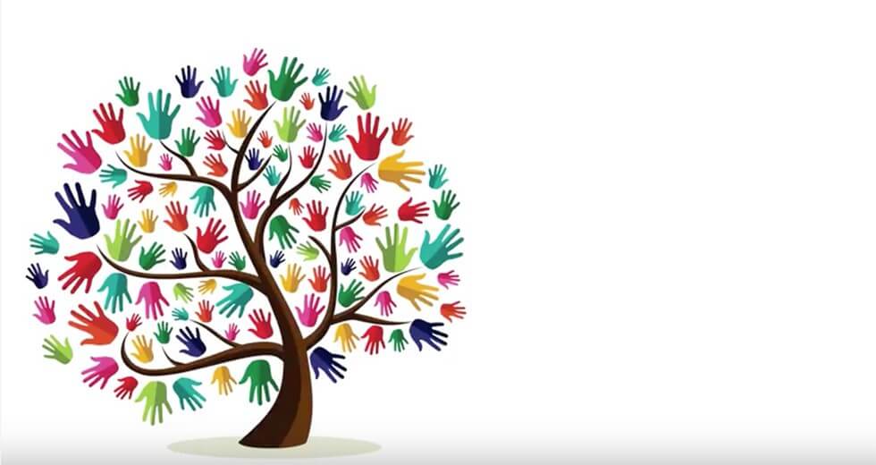 A tree made out of colorful hands.