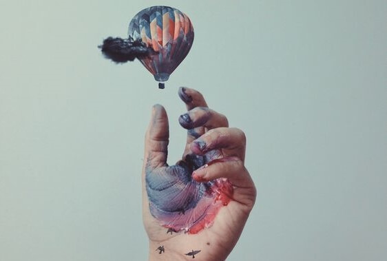 hand and balloon