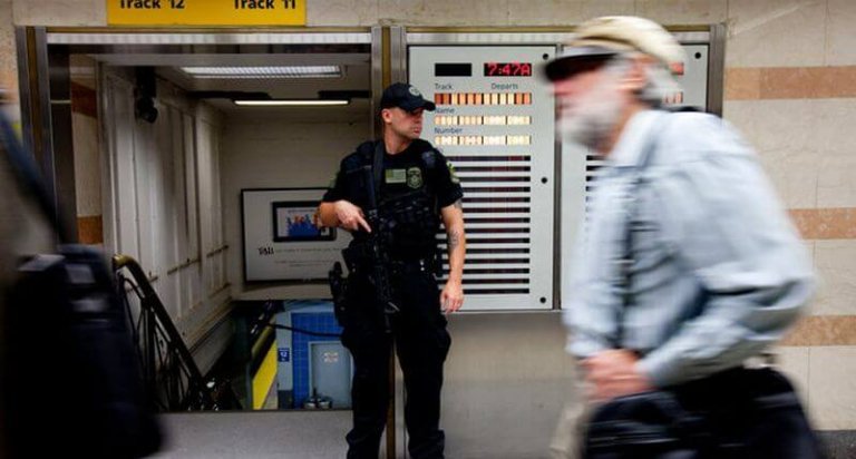 A security guard at a train station.