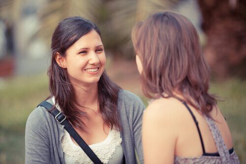 Two women are having a friendly conversation.