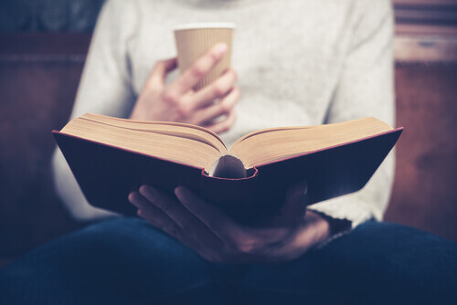 Reading with coffee.