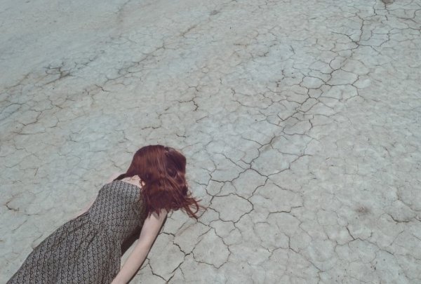 woman lying on floor