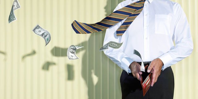 A man is opening a wallet and money is flying away: emotions and money.