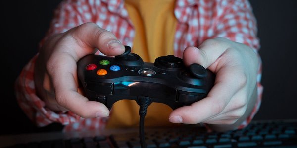 boy playing video game symbolizing video game addiction