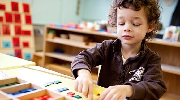 child playing with blocks