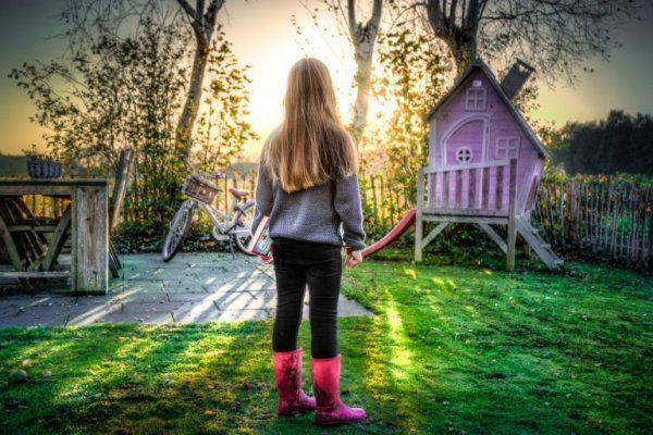 Girl looking at garden