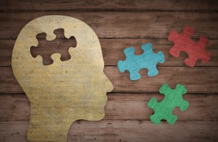 Head with pieces of jigsaw