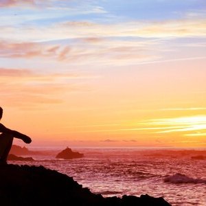 Man looking at sunset