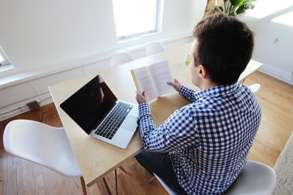 Occupational presenteeism: a man with his laptop.