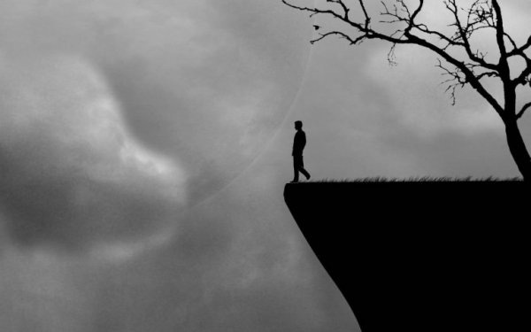 Walking off a cliff.