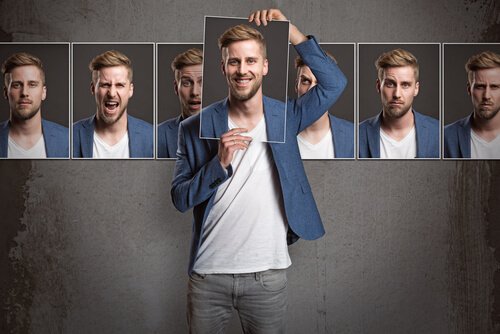 Man holding up images of himself.