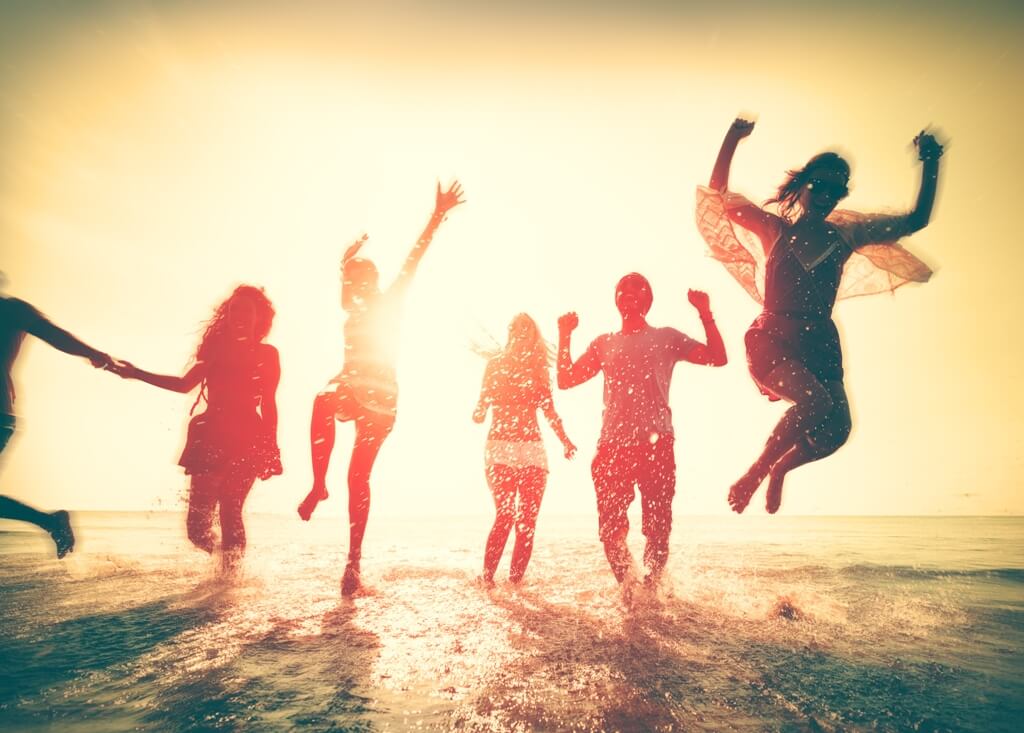 Friends having fun on the beach.